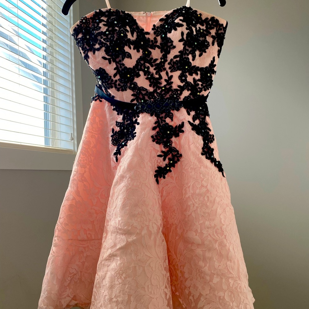 Worn once for grad, never touched it again. it’s a very pretty dress